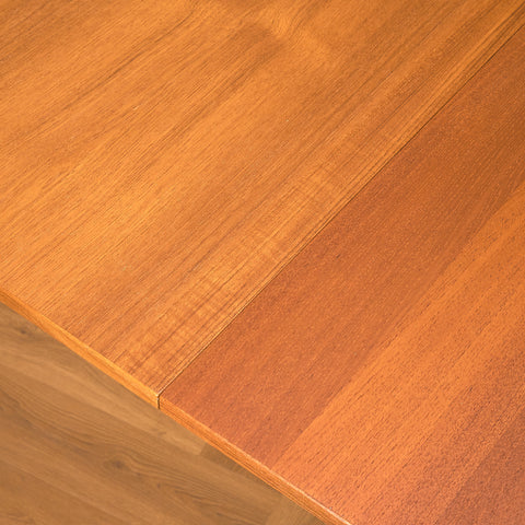 Danish dining table in teak and oak "Arne Vodder style"