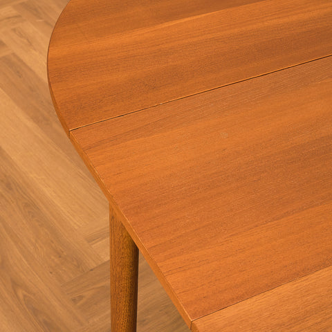 Danish dining table in teak and oak "Arne Vodder style"