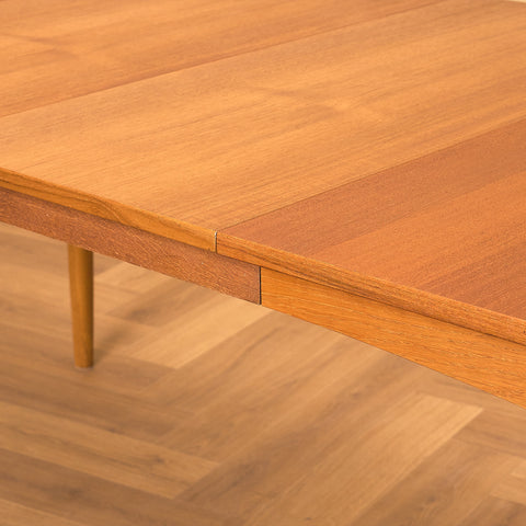 Danish dining table in teak and oak "Arne Vodder style"