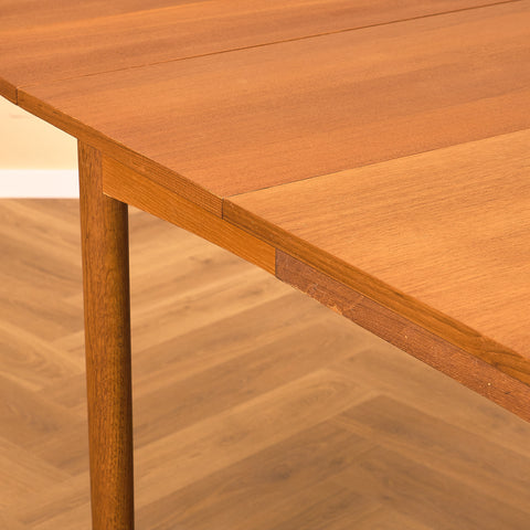 Danish dining table in teak and oak "Arne Vodder style"