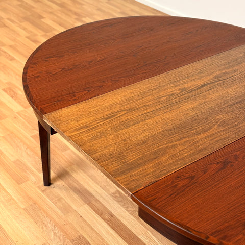 Danish round dining table in Santos rosewood