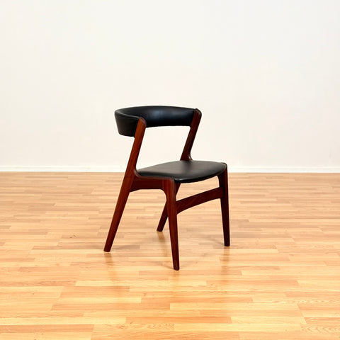 Danish dining chairs in walnut by Kai Kristiansen
