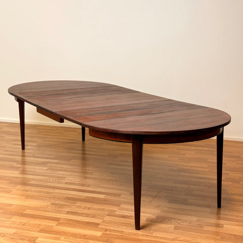 Danish large round dining table in Santos rosewood by Oman Junn