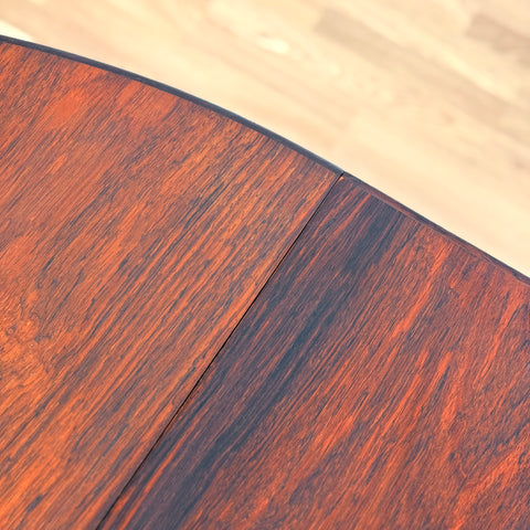 Danish large round dining table in Santos rosewood by Oman Junn