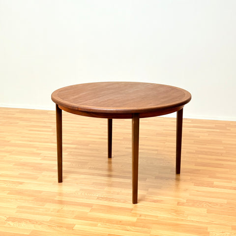 Swedish round dining table in teak