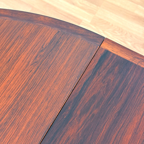 Danish round dining table in Santos rosewood