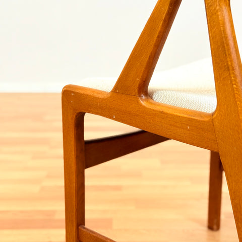 Danish single dining chair in teak by Henning Kjærnulf