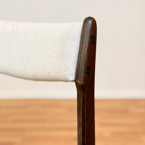 Danish dining chairs in solid stained oak by Erik Buch