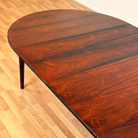 Danish large round dining table in Santos rosewood by Oman Junn
