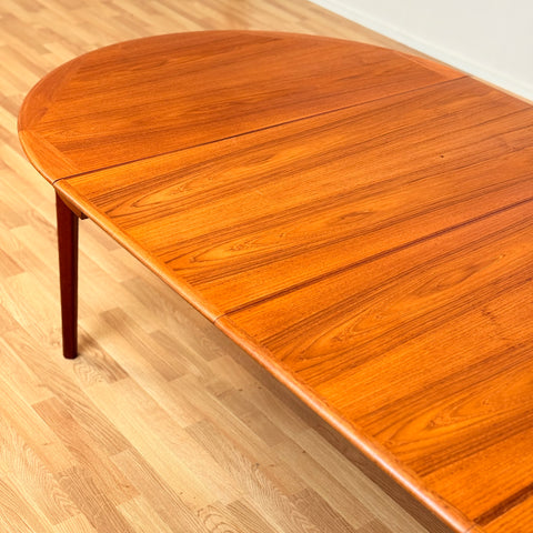 Large danish round dining table in teak