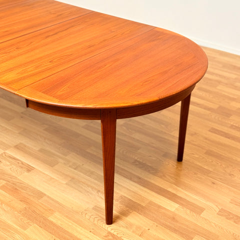 Large danish round dining table in teak