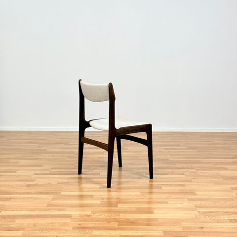 Danish dining chairs in solid stained oak by Erik Buch