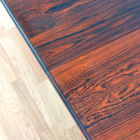 Danish round dining table in Santos rosewood
