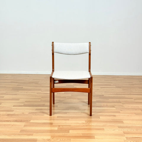 Danish dining chairs in teak by Erik Buch