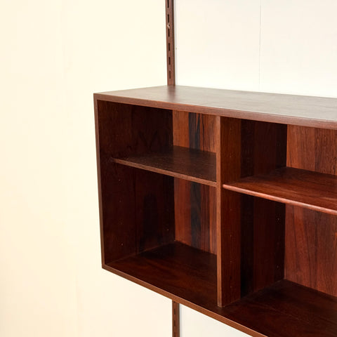 Danish wall unit / shelving system in Santos rosewood by Kai Kristiansen, for FM Mobler