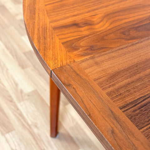 Swedish round dining table in walnut by Skaraborgs Mobelindustri