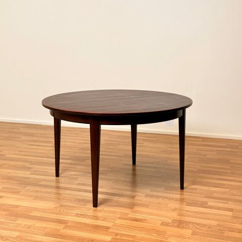 Danish round dining table in Santos rosewood by Oman Junn