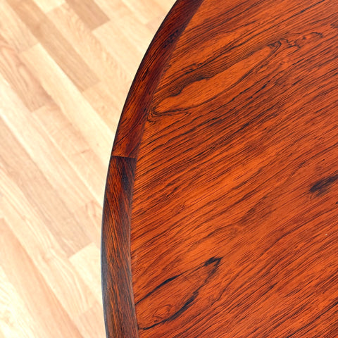 Danish round dining table in Santos rosewood