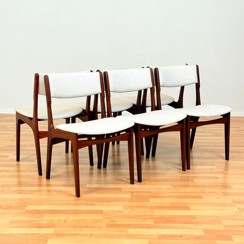 Danish set of 6 dining chairs in walnut by Eric Buch