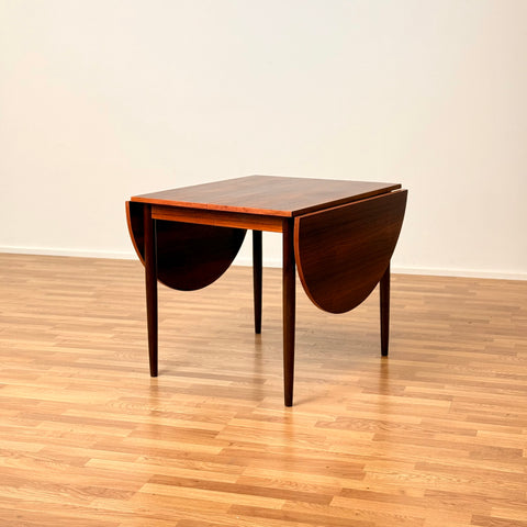 Danish dining table in Santos rosewood "Arne Vodder style"
