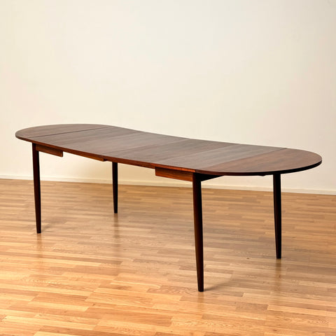 Danish dining table in Santos rosewood with 4 extensions 'Arne Vodder style'