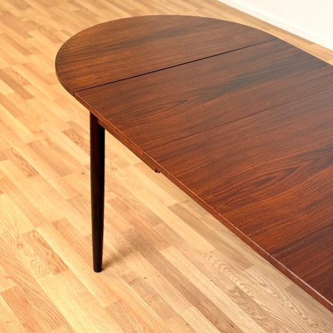 Danish dining table in Santos rosewood with 4 extensions 'Arne Vodder style'