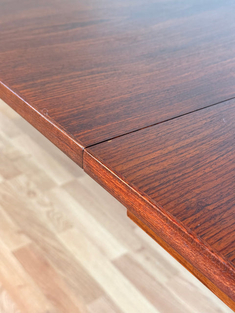 Danish dining table in Santos rosewood with 4 extensions 'Arne Vodder style'