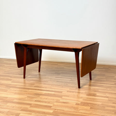 Dining table in teak with flip-flap extensions, 1950s-60s - Beyo Vintage