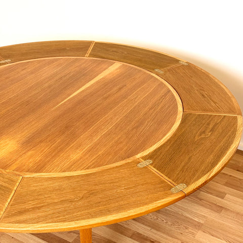 Flip-flap round dining table in oak by Dyrlund, 1970s, Denmark - Beyo Vintage