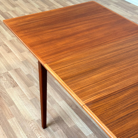 Rectangular dining table with extensions in teak, 1950s-60s, Sweden - Beyo Vintage