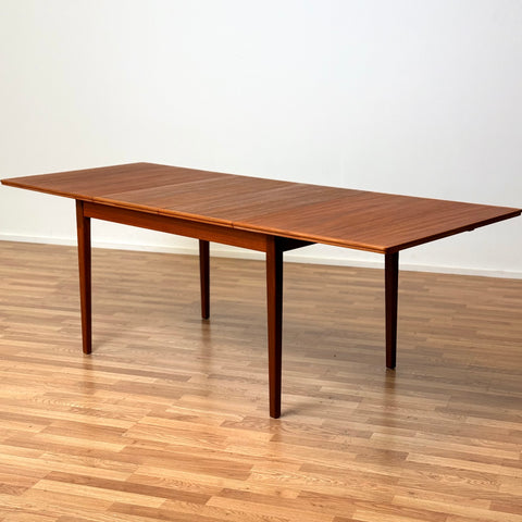 Rectangular dining table with extensions in teak, 1950s-60s, Sweden - Beyo Vintage