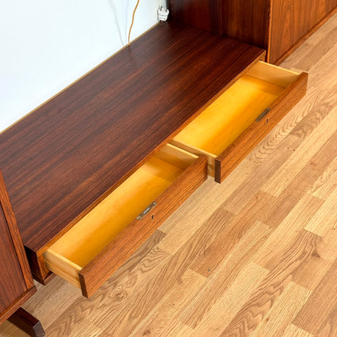 Wall unit / Shelving system in Santos rosewood, 1950s-60s, Sweden